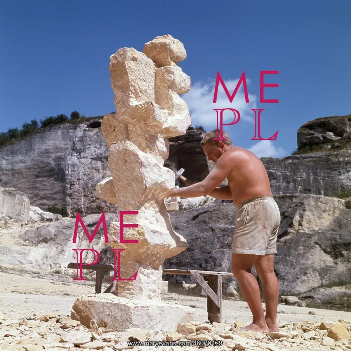 : Andreas Urteil, Austrian sculptor, at work in Roman quarry : Andreas Urteil, Austrian sculptor, at work in Roman quarry
