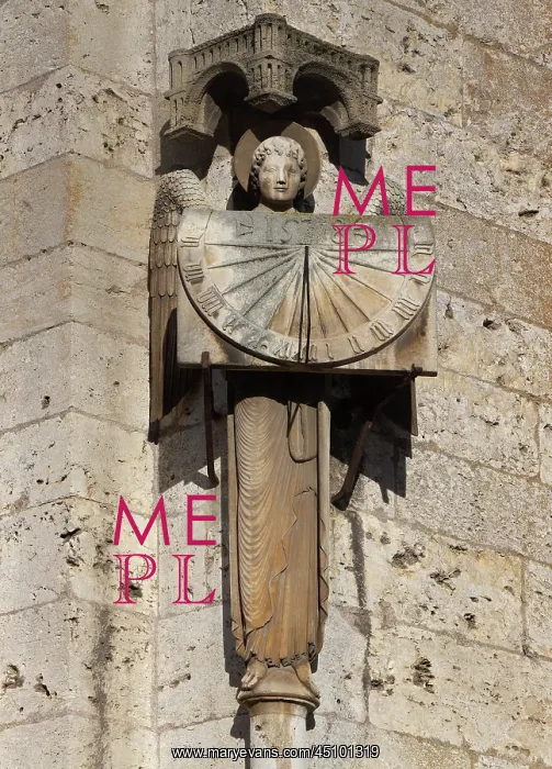 : Angel with sundial, Chartres Cathedral, Chartres, France : Angel with sundial, Chartres Cathedral, Chartres, France