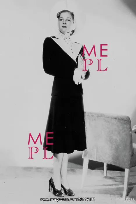 : Ann Morriss wearing a smart suit designed by Dolly Tree : Ann Morriss wearing a smart suit designed by Dolly Tree