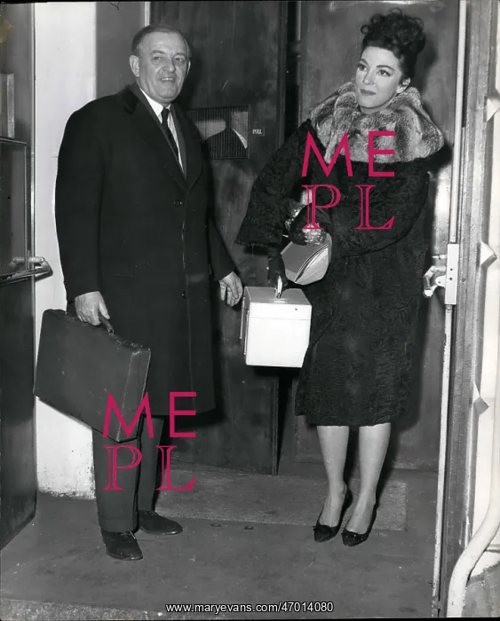 : Anna Moffo, opera singer, with doctor, Covent Garden, London : Anna Moffo, opera singer, with doctor, Covent Garden, London
