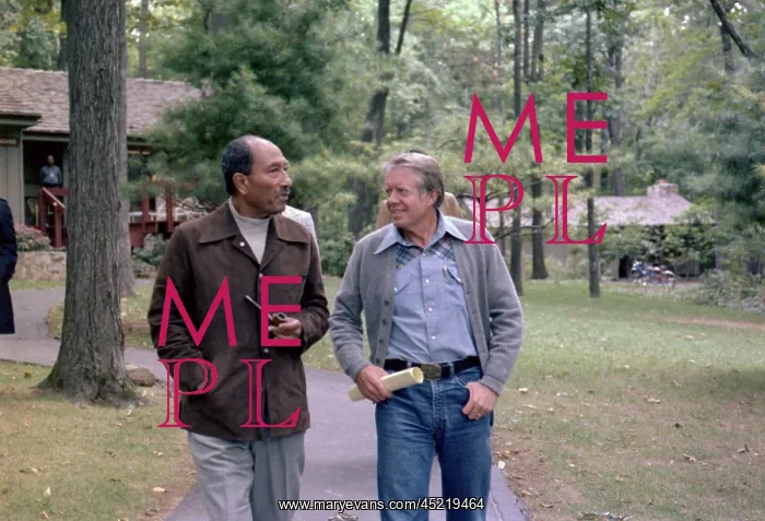 : Anwar Sadat and Jimmy Carter walking at ? : Anwar Sadat and Jimmy Carter walking at ?