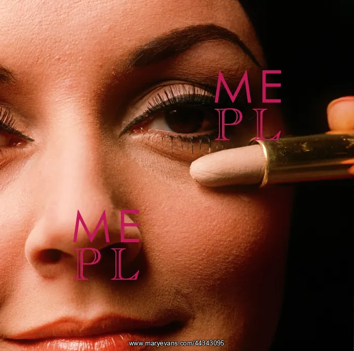  : Applying concealer makeup on female model