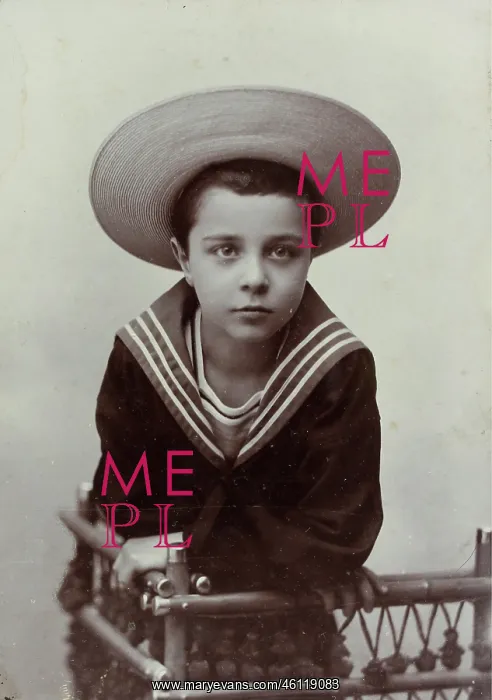 : An approximately 8-year-old boy with straw : An approximately 8-year-old boy with straw