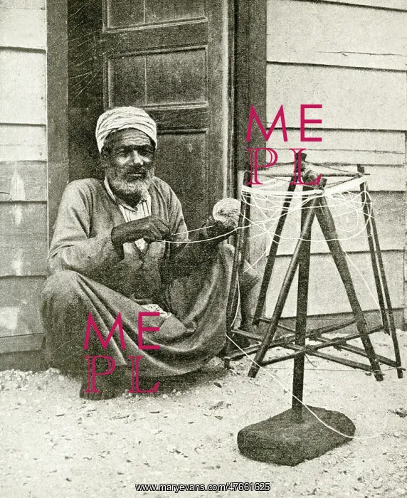 : Arab fisherman winding twine for nets, Port Said, Egypt : Arab fisherman winding twine for nets, Port Said, Egypt