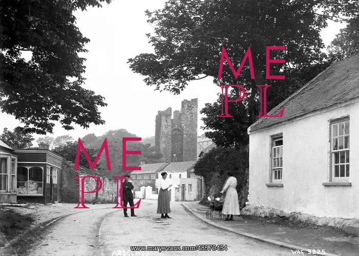 : Ardglass - a view on the Main road looking towards the Castle with three : Ardglass - a view on the Main road looking towards the Castle with three