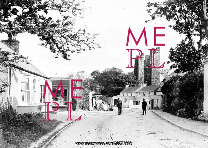 : Ardglass - a view of the town looking up to the Castle with two men on the road : Ardglass - a view of the town looking up to the Castle with two men on the road