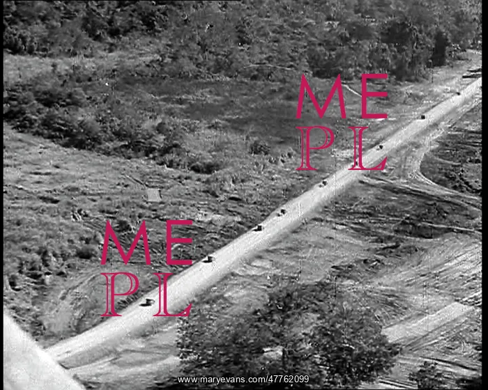 : Ariel View of Supply Trucks Driving Down a : Ariel View of Supply Trucks Driving Down a