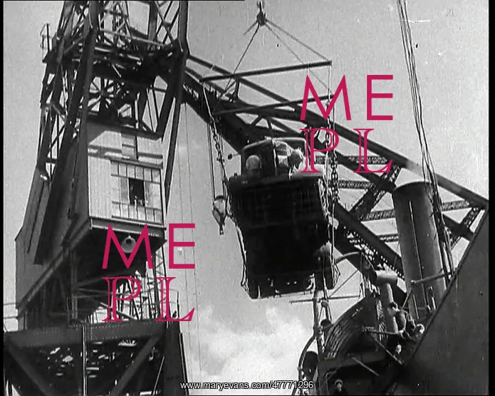 : Army Lorry In Mid Air Being Hoisted Onto a : Army Lorry In Mid Air Being Hoisted Onto a