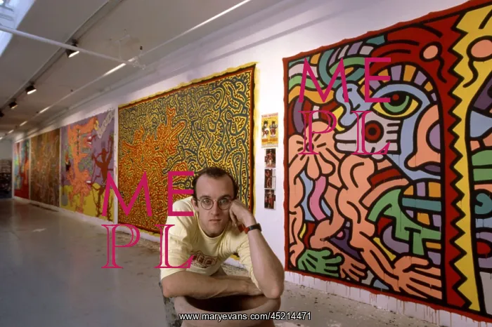 : Artist Keith Haring standing in front of ? : Artist Keith Haring standing in front of ?