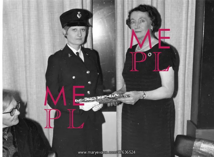 : Assistant HMI Kathleen May Hill receiving gift : Assistant HMI Kathleen May Hill receiving gift