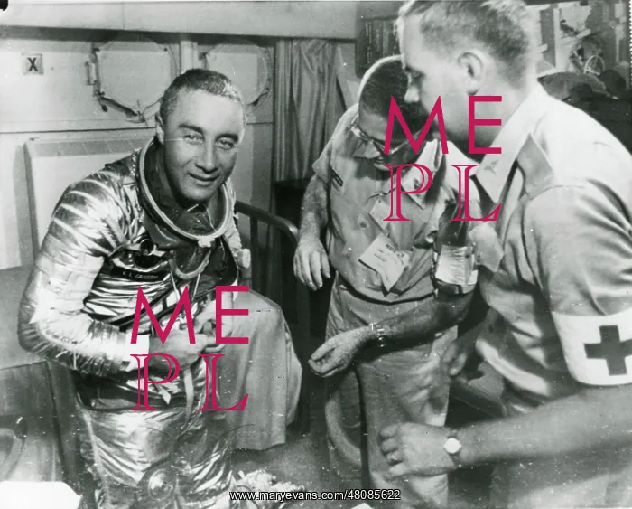 : Astronaut Virgil ?Gus? Grissom starts to remove his spa? : Astronaut Virgil ?Gus? Grissom starts to remove his spa?