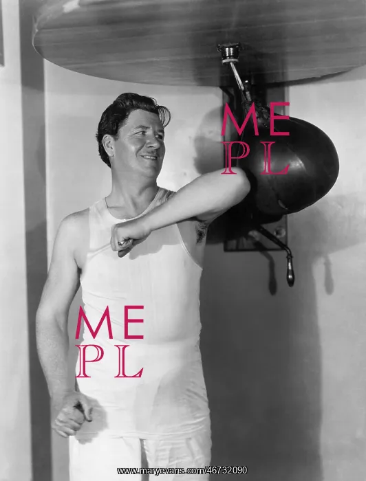 : Athlete working out with a punching bag : Athlete working out with a punching bag