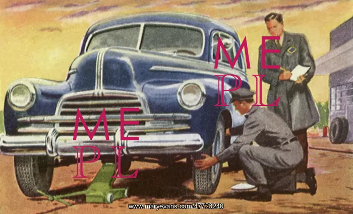  : Attendant Changes Tire