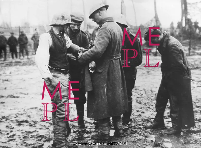 : Attending to wounded German prisoner, WW1 : Attending to wounded German prisoner, WW1