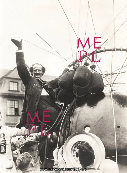 : Auguste Piccard waves as he climbed into the spherical : Auguste Piccard waves as he climbed into the spherical