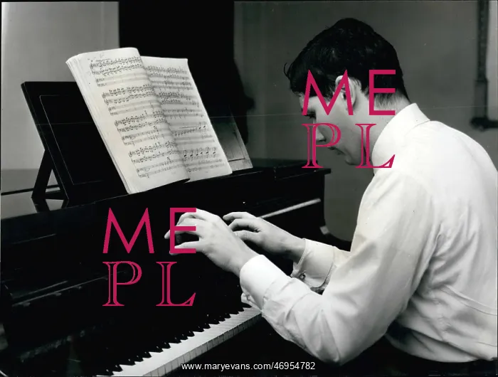 : Augustine Anievas rehearsing at the piano : Augustine Anievas rehearsing at the piano