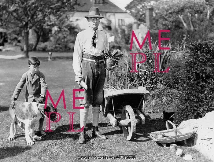 : Austen Chamberlain working in the garden with his son : Austen Chamberlain working in the garden with his son