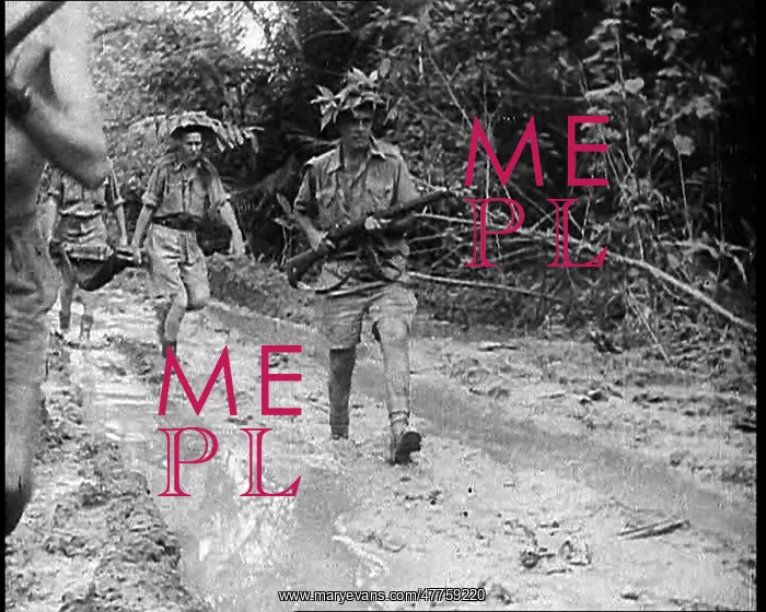 : Australian Troops Trudging Through Mud in New Guinea : Australian Troops Trudging Through Mud in New Guinea