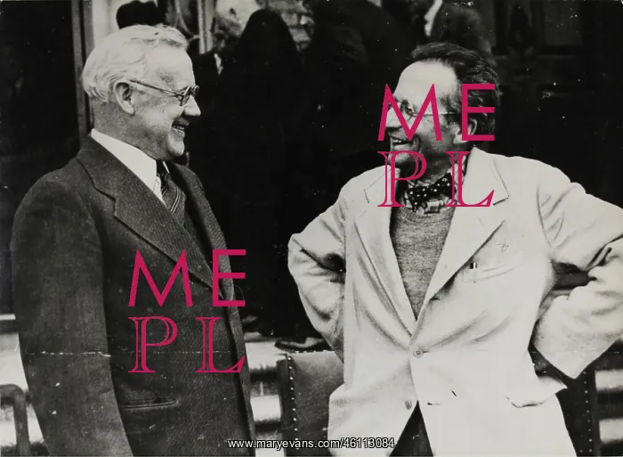  : Austrian physicist Erwin Schrodinger (right) talking wit