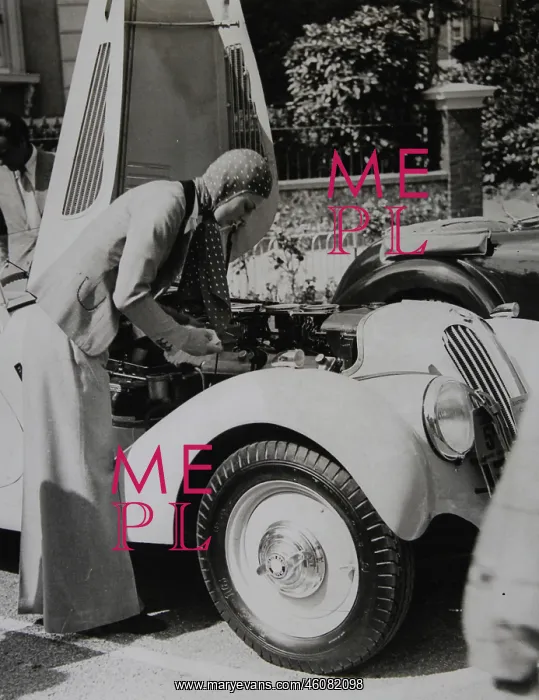 : An automobile driver in front of her : An automobile driver in front of her