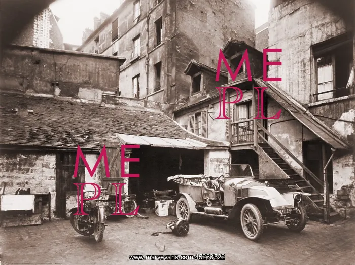 : Automobile and two motorcycles in courtyard ? : Automobile and two motorcycles in courtyard ?