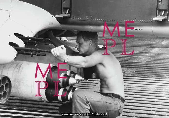 : Aviation Machinist Mate drains a fuel sample : Aviation Machinist Mate drains a fuel sample