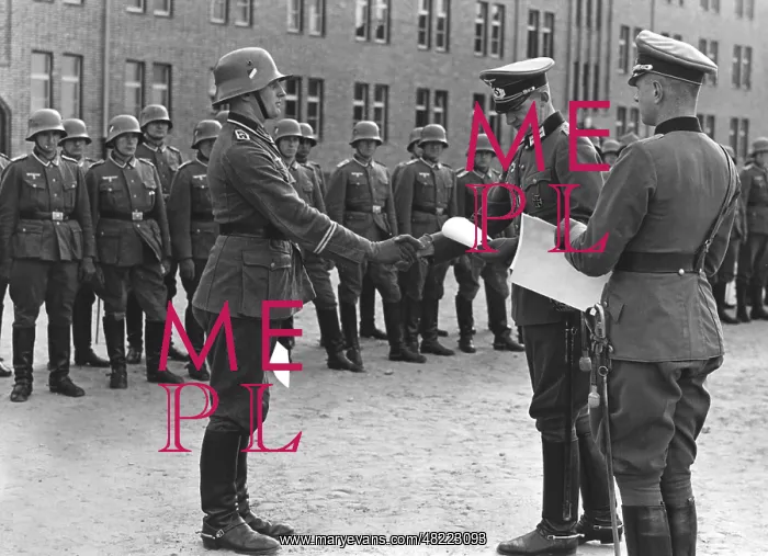 : Awarding of service decorations to members of the Wehrma : Awarding of service decorations to members of the Wehrma