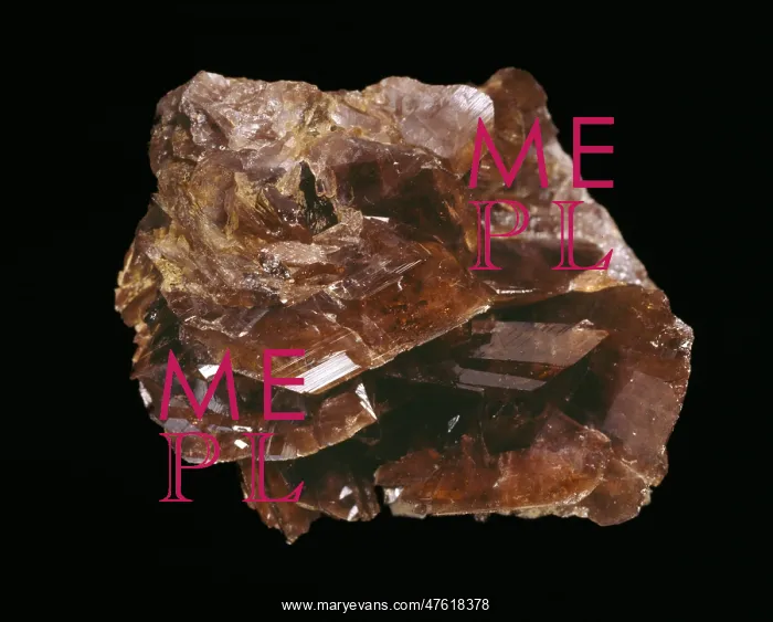: Axinite. Specimen number BM 1969, 286. Stamps : Axinite. Specimen number BM 1969, 286. Stamps