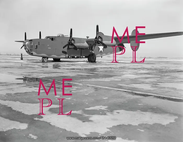 : A B-24E Liberator bomber on the tarmac at : A B-24E Liberator bomber on the tarmac at