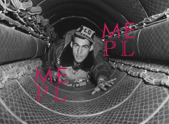 : B-29 gunner in the 35-foot tunnel connecting the : B-29 gunner in the 35-foot tunnel connecting the