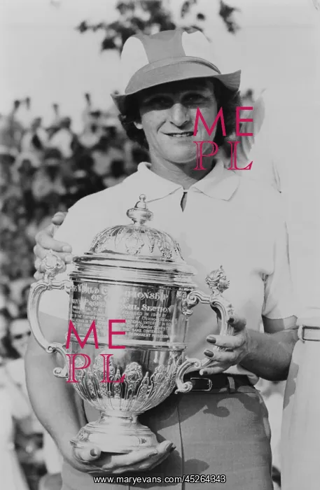 : Babe Didrikson Zaharias holding trophy after the : Babe Didrikson Zaharias holding trophy after the