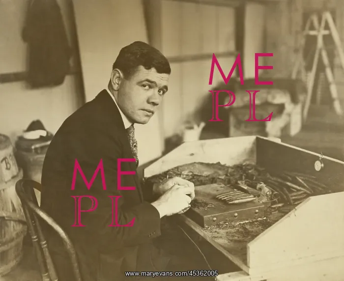 : Babe Ruth rolling a Babe Ruth Cigar for his new : Babe Ruth rolling a Babe Ruth Cigar for his new
