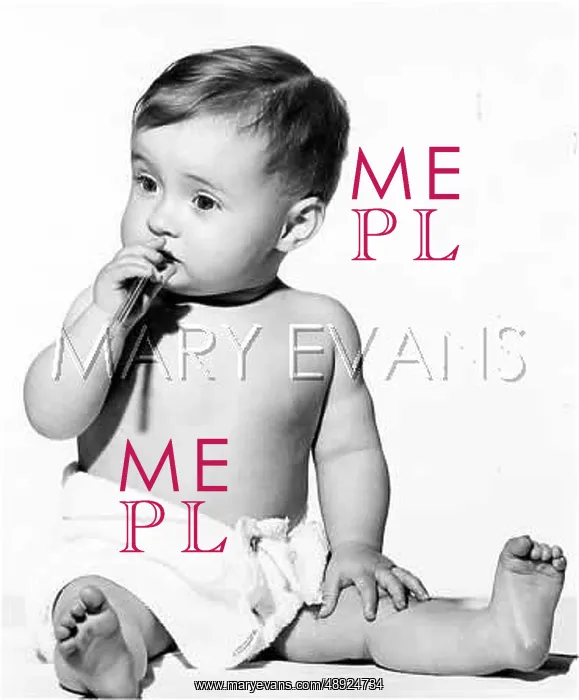  : A BABY. A baby sucking a ballpoint pen