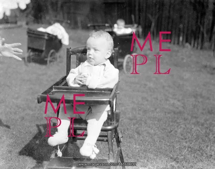  : BABY IN A HIGHCHAIR