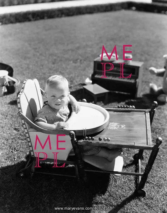  : Baby in highchair outside