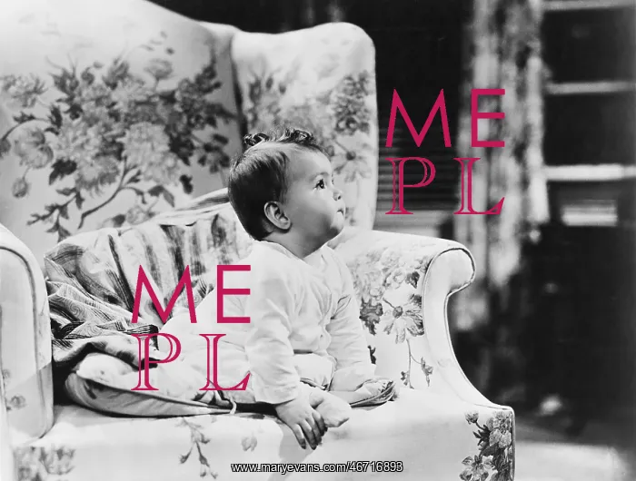 : Baby sitting on armchair : Baby sitting on armchair