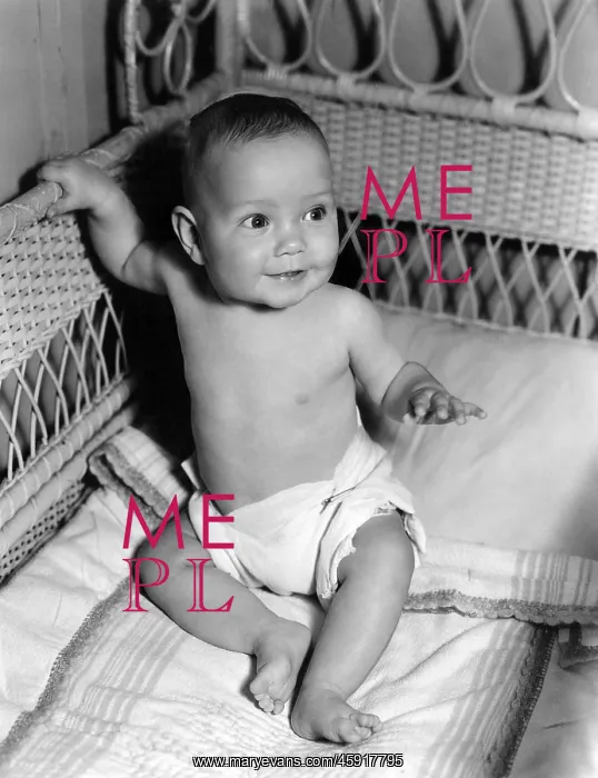  : Baby sitting up in crib