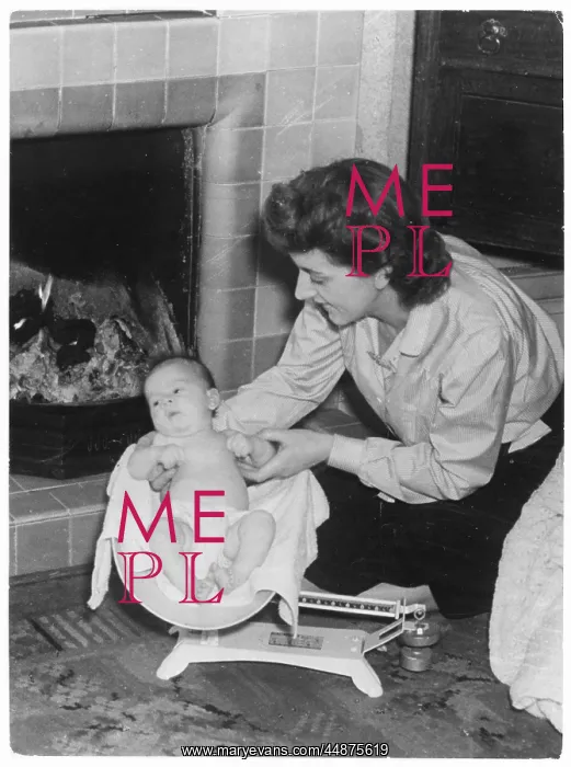 : BABY BEING WEIGHED : BABY BEING WEIGHED