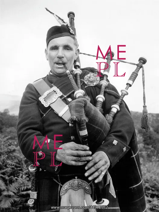 : Bagpiper in the Trossachs, Scotland : Bagpiper in the Trossachs, Scotland