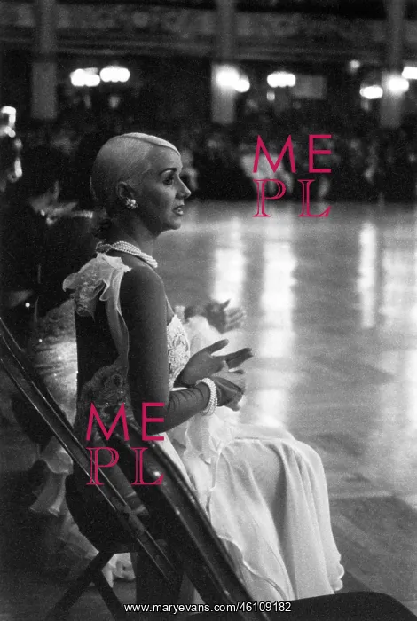 : Ballroom dancer sitting at side of dance floor : Ballroom dancer sitting at side of dance floor