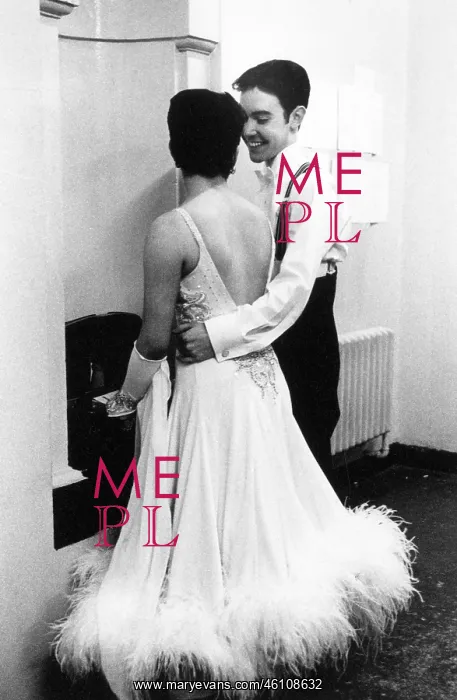 : Ballroom dancing couple in dressing room : Ballroom dancing couple in dressing room