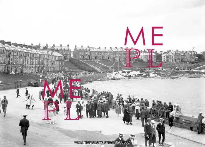 : Bangor - a very busy view of people sitting on the sea wall towards Lenaghan's Boats : Bangor - a very busy view of people sitting on the sea wall towards Lenaghan's Boats