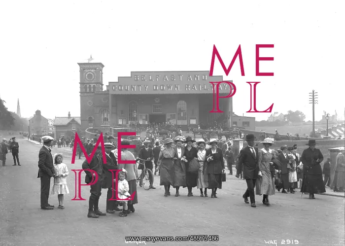 : Bangor - a very busy view of people leaving the railway station : Bangor - a very busy view of people leaving the railway station