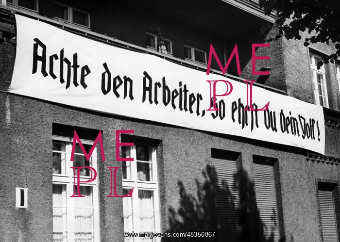 : A banner saying Respect the worker, and honour : A banner saying Respect the worker, and honour