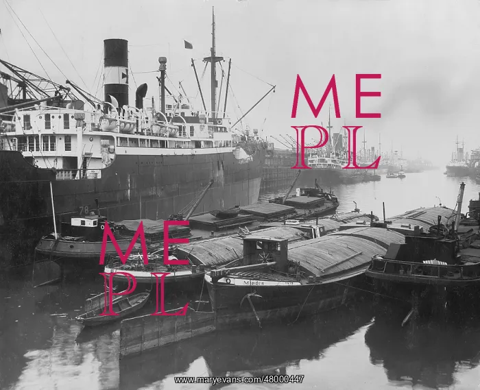  : Barges and freighter in harbour of Bremen, Germany