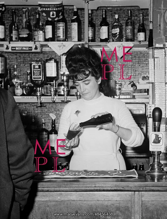 : BARMAID POURING DRINK : BARMAID POURING DRINK