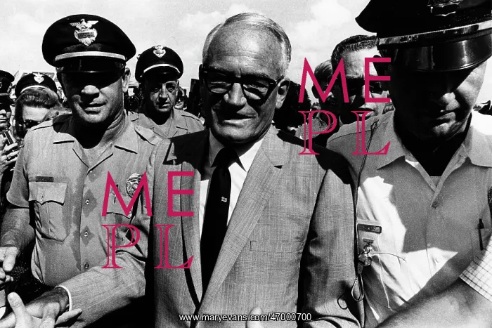 : Barry Goldwater walking with escorts : Barry Goldwater walking with escorts
