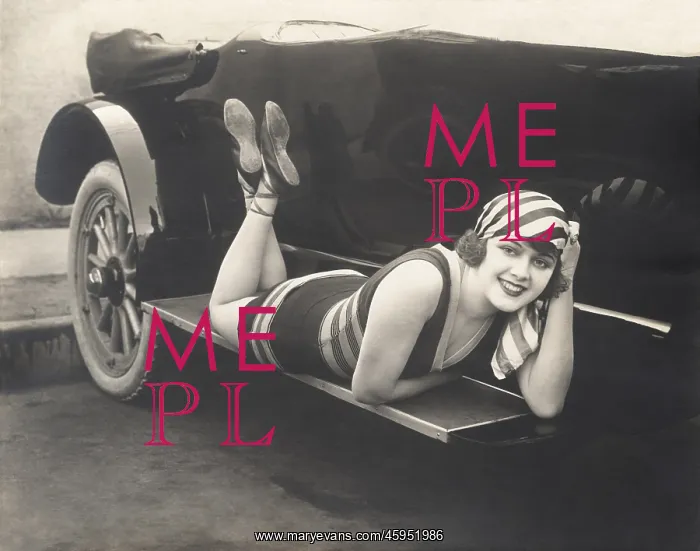 : Bathing beauty posing on running board of convertible : Bathing beauty posing on running board of convertible