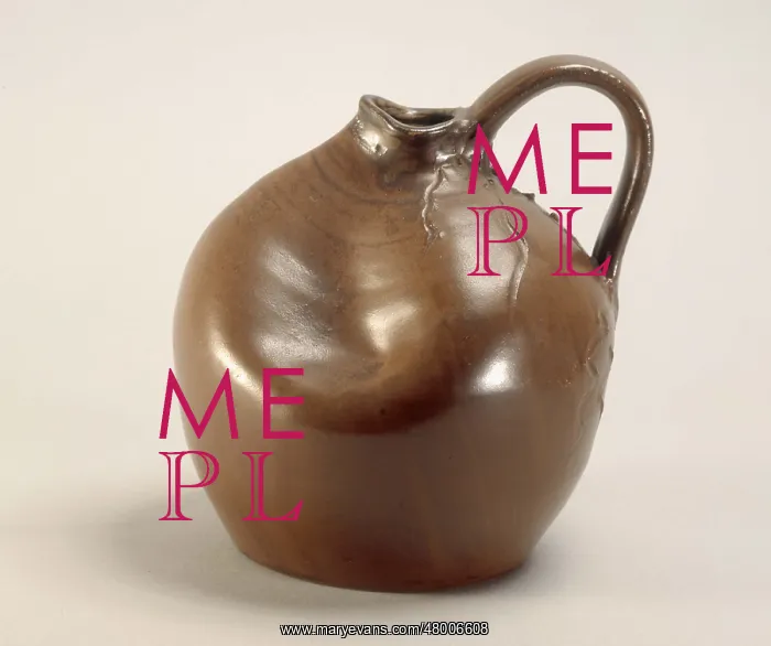 : Battered pot with a handle : Battered pot with a handle