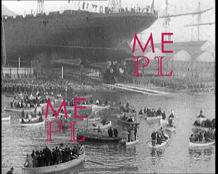 : A Battleship Slides Down into the Water. Alongside : A Battleship Slides Down into the Water. Alongside
